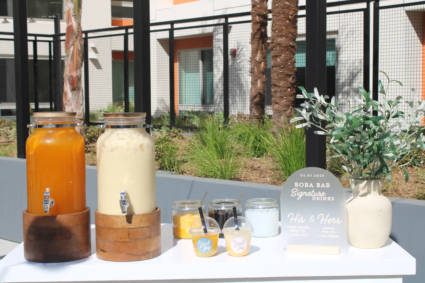 Outdoor Pearl & Joy boba bar with signature his-and-hers drinks
