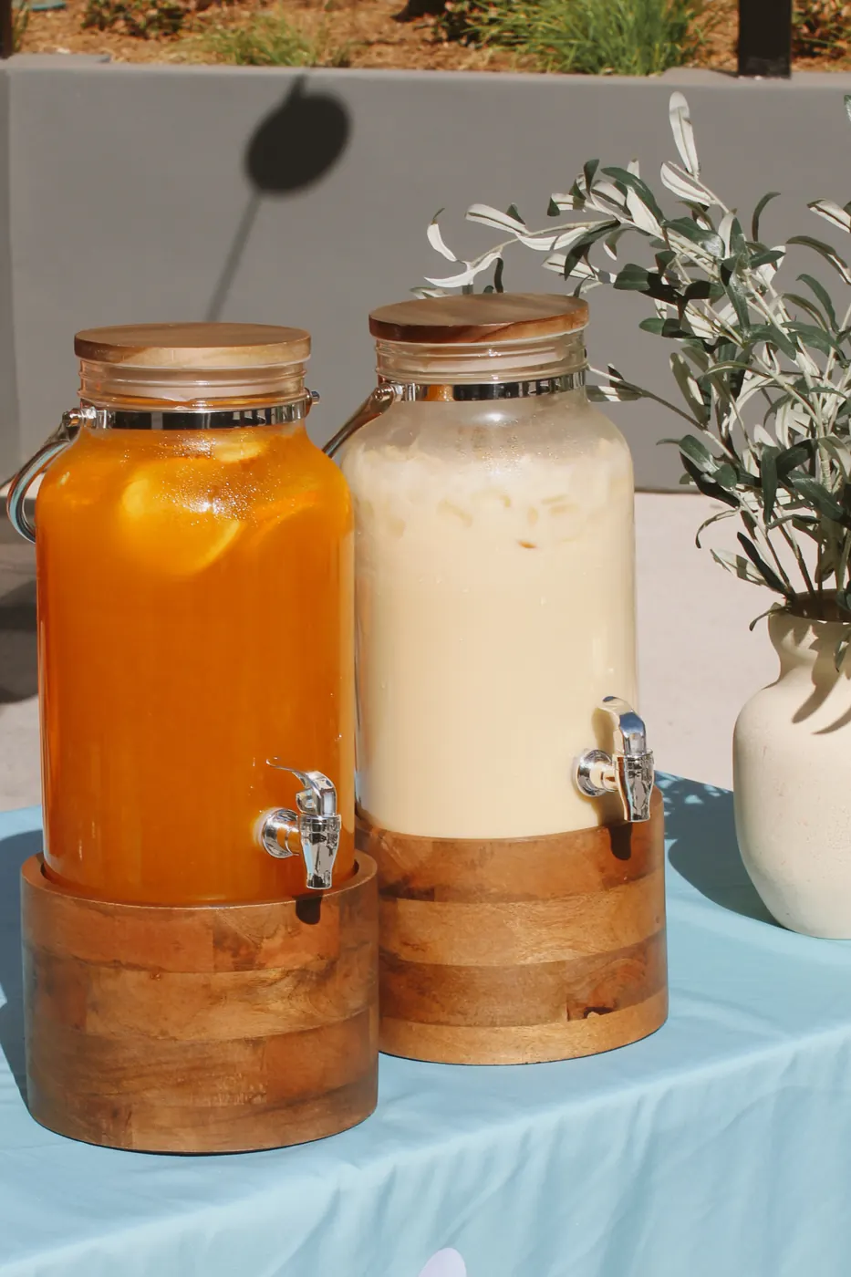 Pearl & Joy mango passion green tea and jasmine milk tea dispensers